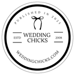 Round black and white Wedding Chicks logo. Features a bow, text, and website address.