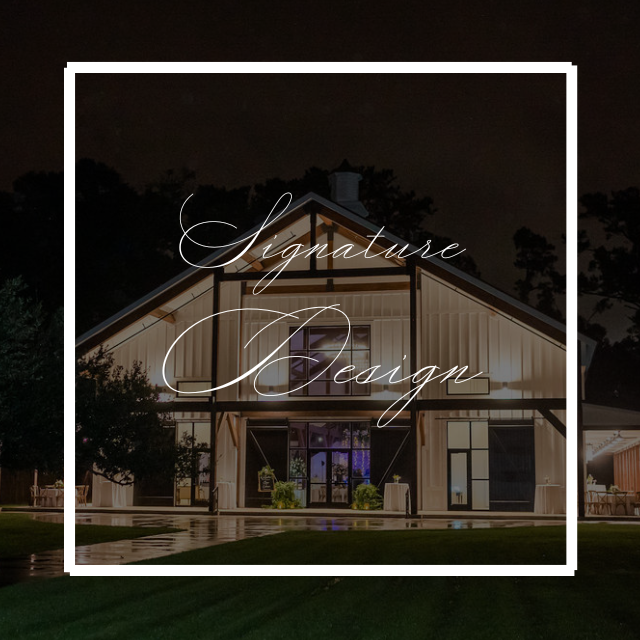 A modern barn at night with