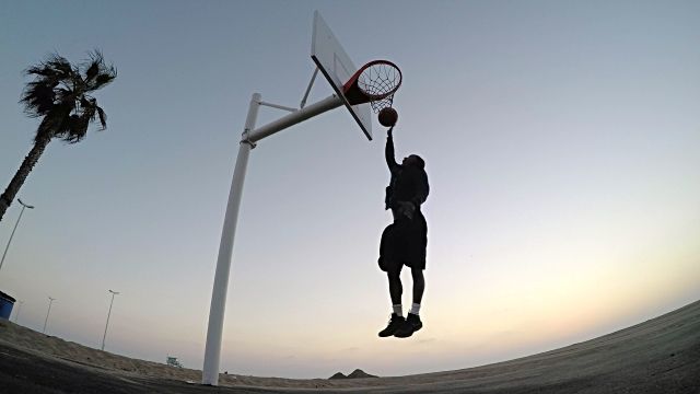 man playing basketball