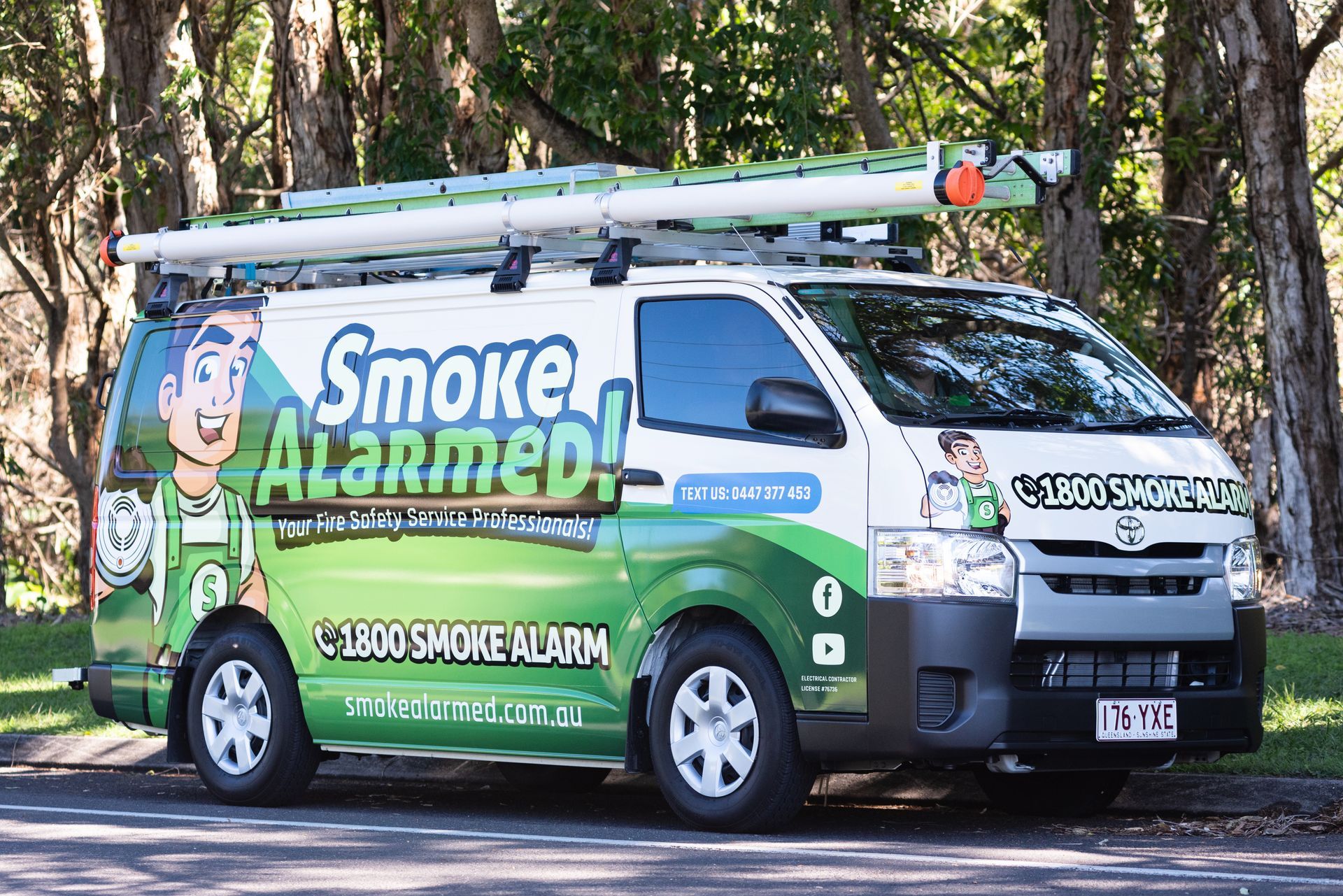 Friendly Technician Providing Smoke Alarm Service Sunshine Coast