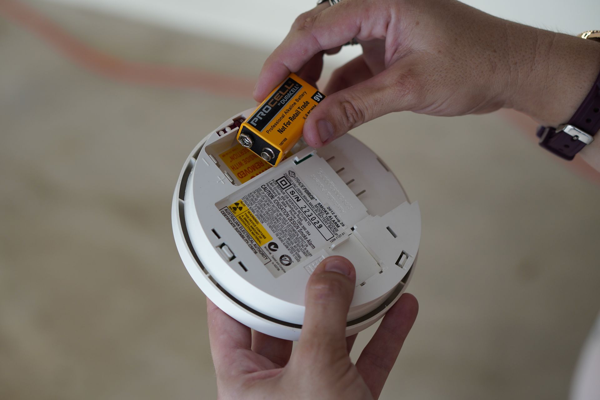 Inserting New 9-Volt Smoke Battery