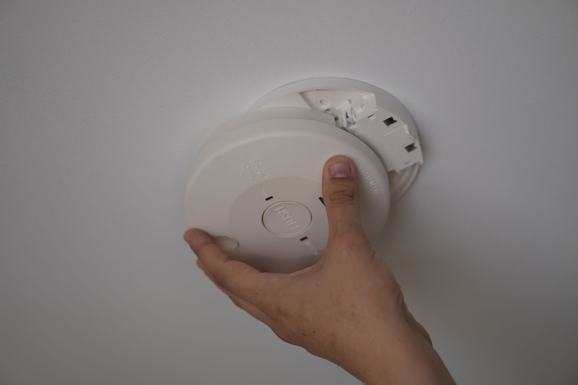 Slide Smoke Alarm In Arrow Direction