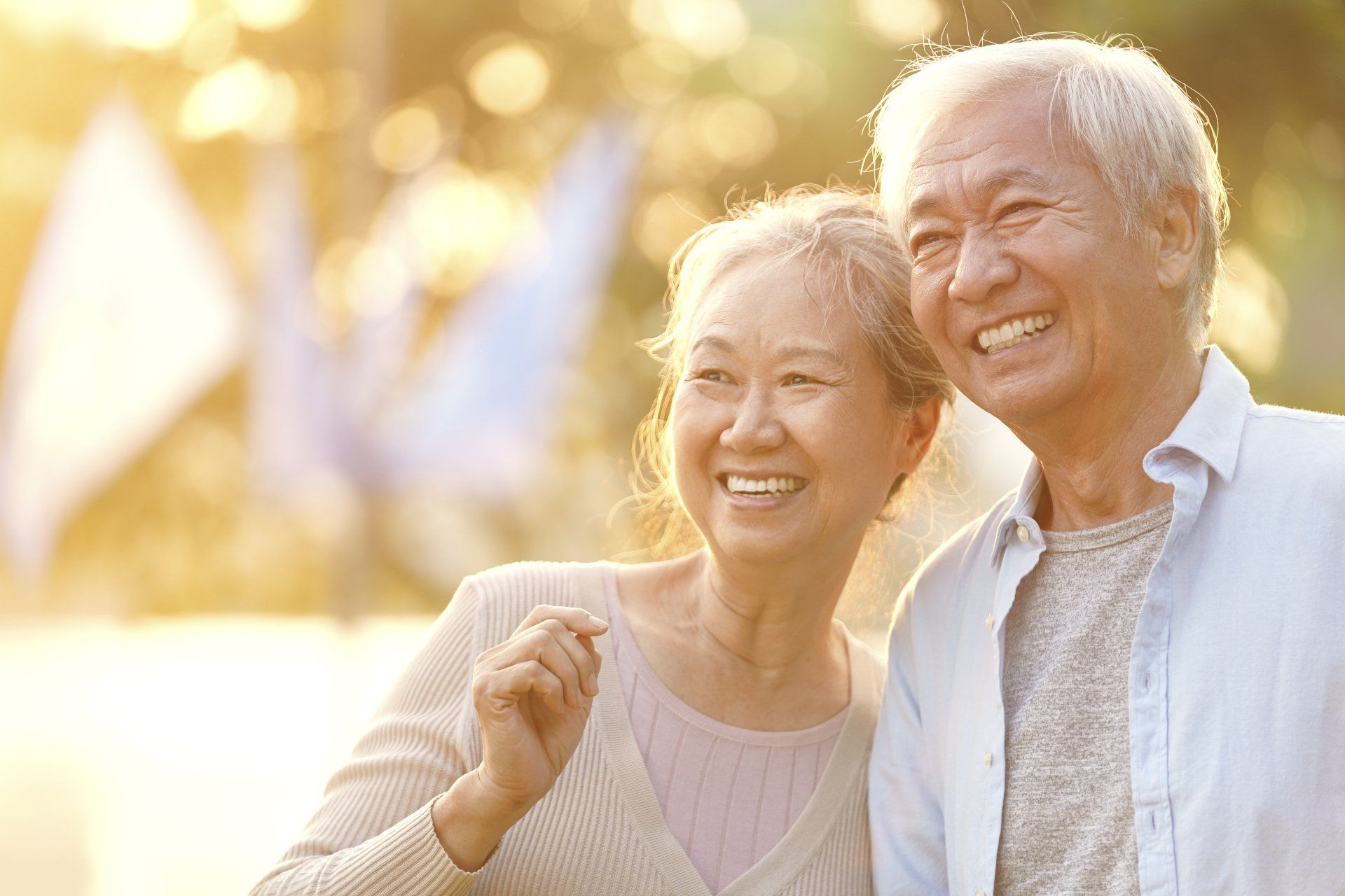 smiling older couple with dentures
