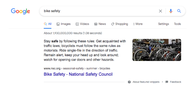 A blurred image of a google search for bike safety.