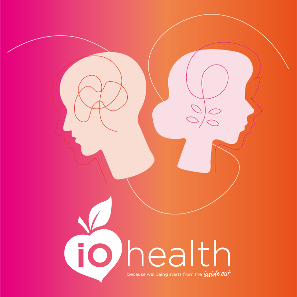 A logo for io health with two heads and an apple