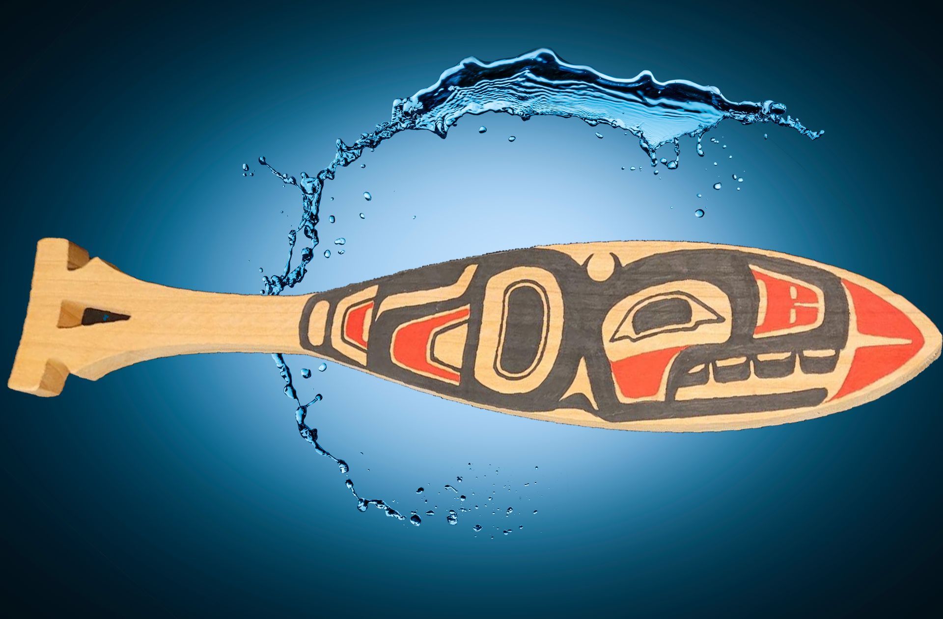 man dressed in tlingit attire an 2 dance paddles