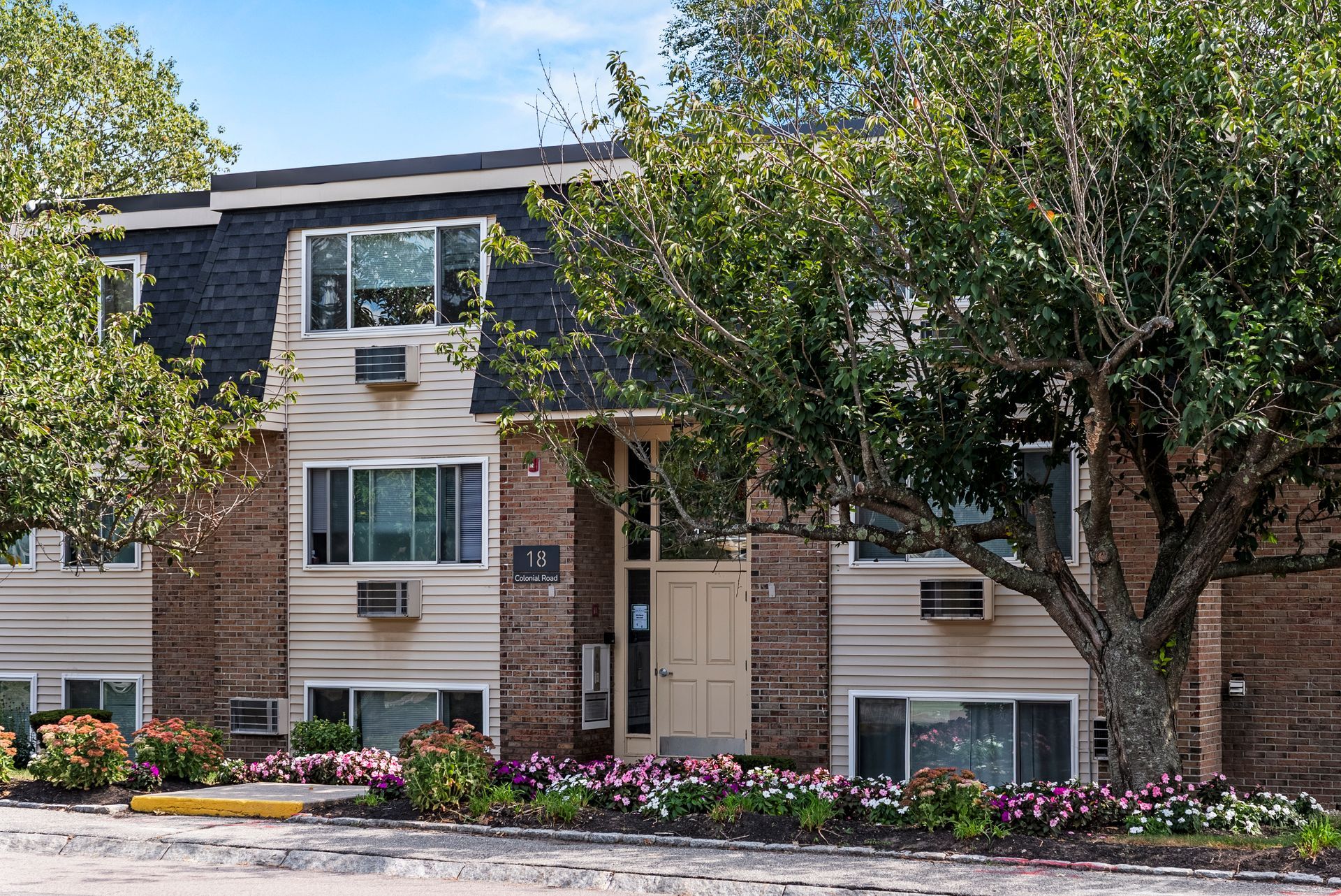 Building exterior at The Groves at Milford in Milford, MA.