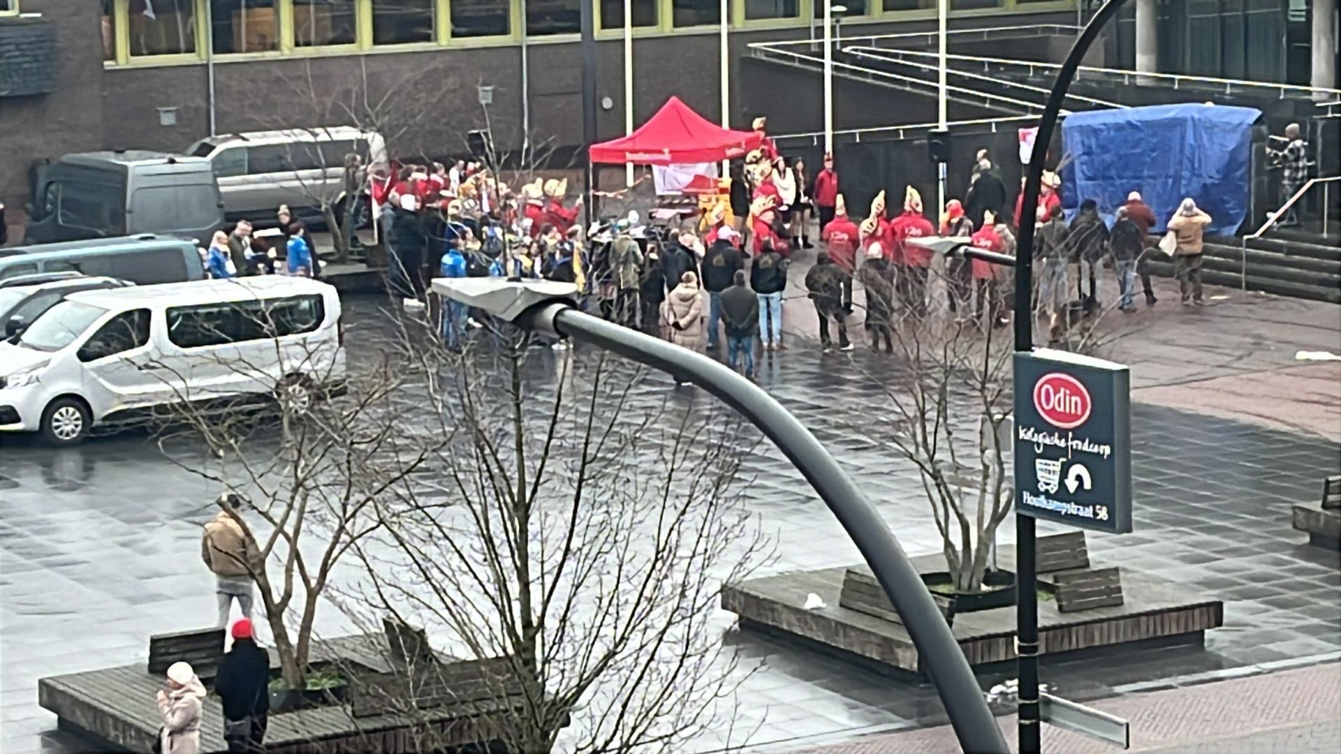 Grilling food with tongs. Bowling pins lined up, reflecting on the floor.