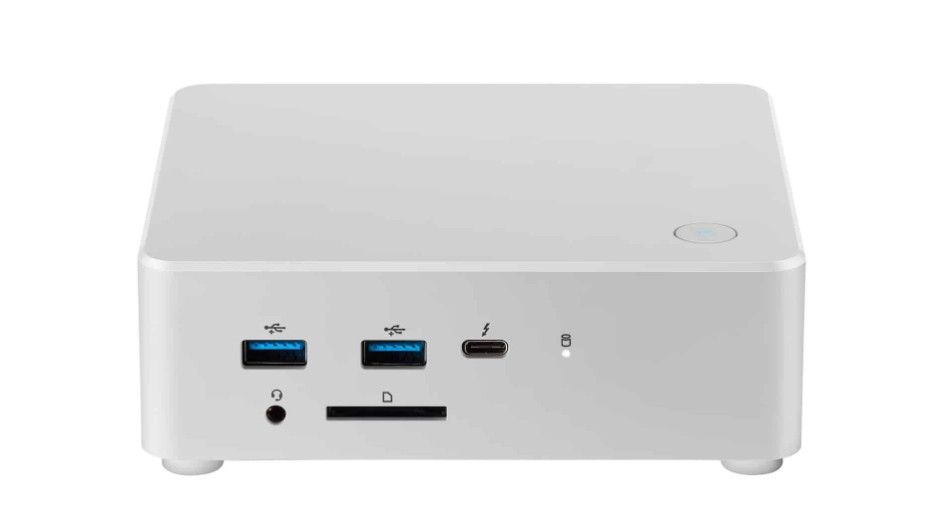 Een klein wit computerkastje met veel aansluitingen.