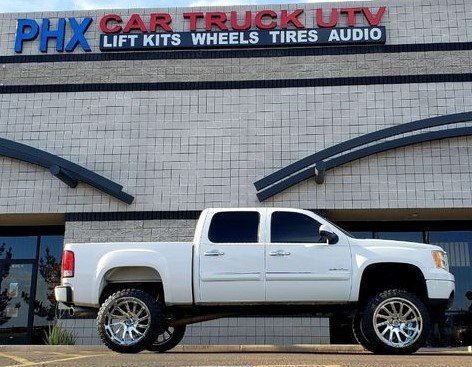 GMC SIERRA 1500 7.5 RC LIFT KIT 24X12 HARDCORE CHROME WHEELS AND 35X12.50R24 M/T TIRES