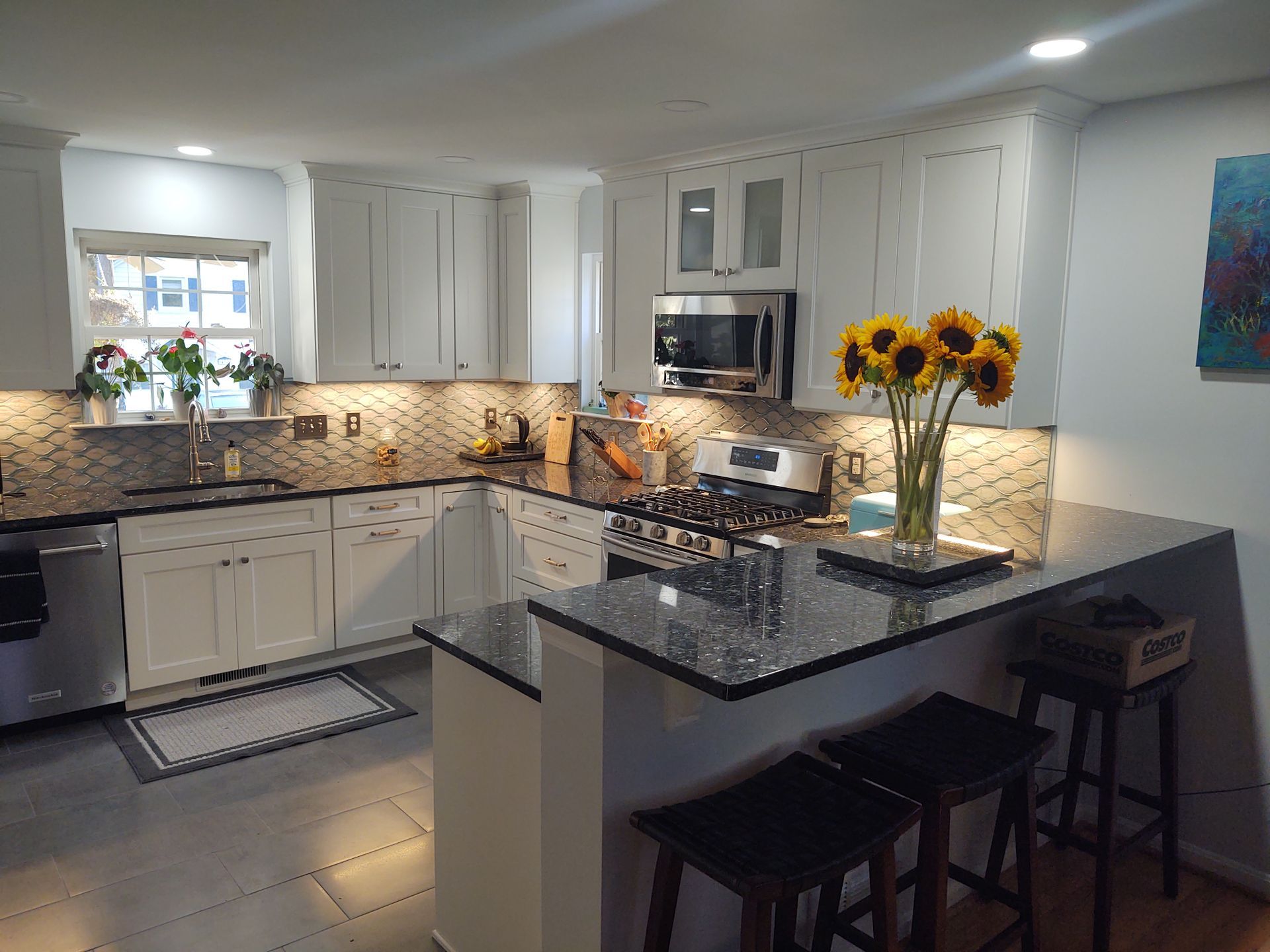 kitchen remodel white cabinetry, granite countertop