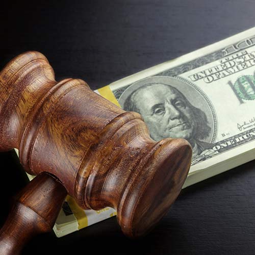 Justice gavel and money - Bail bonding in Charlotte, NC