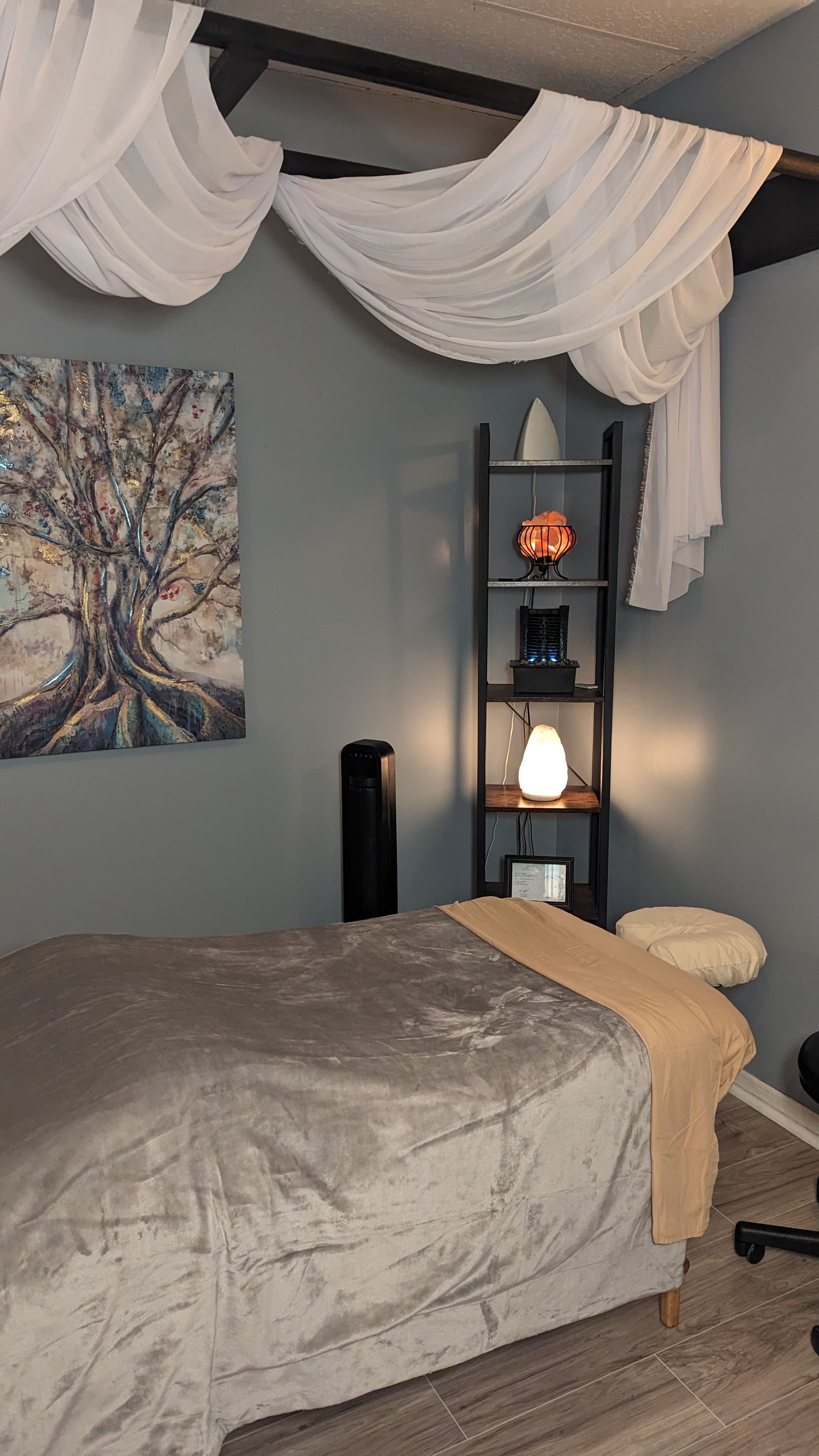 There is a bed in the middle of the room.