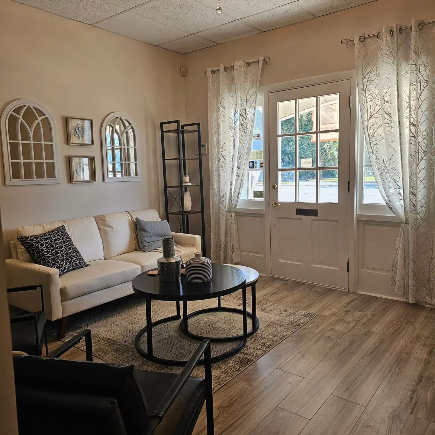 The front lobby of New Eden Spa with a couch and two coffee tables