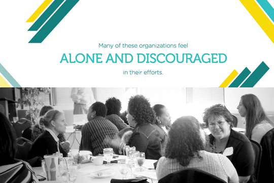 A group of people are sitting at a table with the words alone and discouraged in their efforts