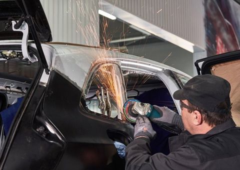 Auto body expert doing premium auto body repair — Port Allen, LA — Delaune’s Auto Body