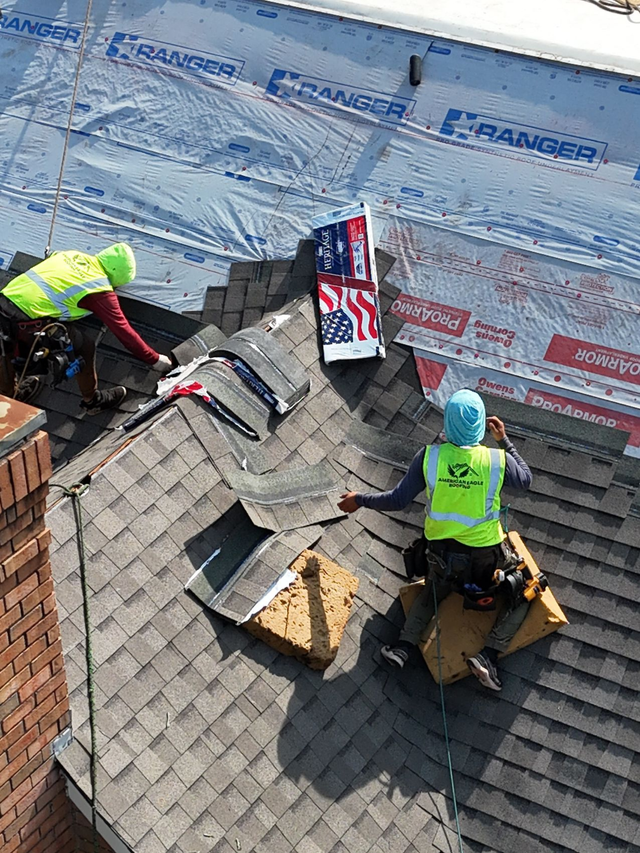 American Eagle Roofing installing shingles on a multi family property in North Carolina