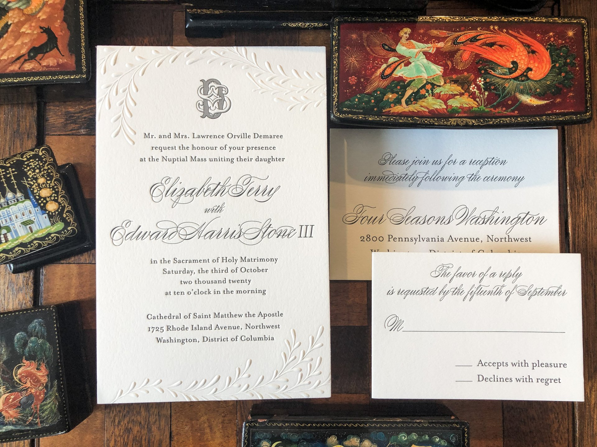 an oversized elegant letterpress invitation suite + a blind embossed leaf branch inspired by the brides oscar de la renta gown embroidery + a custom initial monogram
