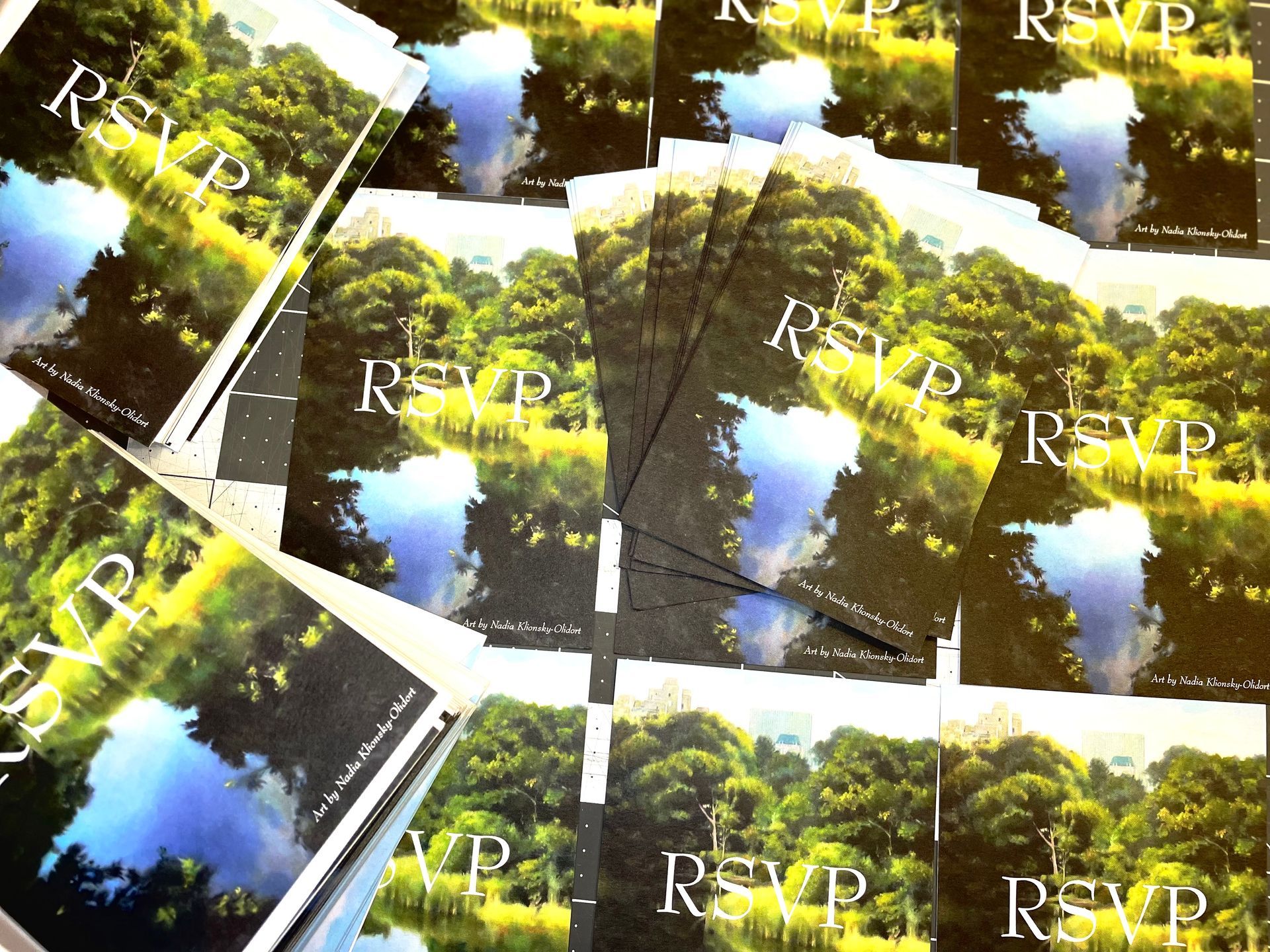 a custom oil painting of central park in new york done by the groom's mother printed on the back of the rsvp