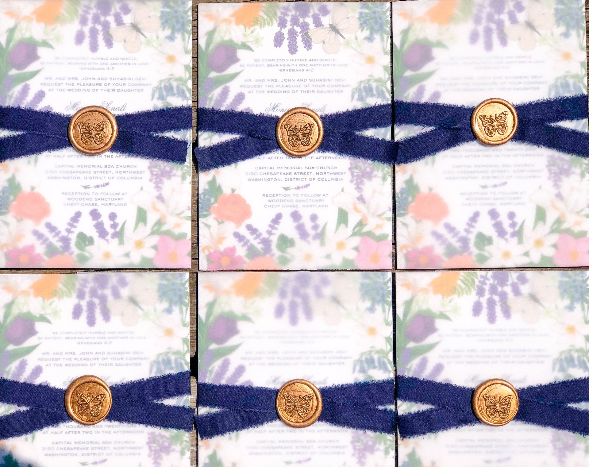 A bunch of cards with flowers on them and buttons on them.