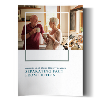 A man and a woman are standing in a kitchen drinking coffee.