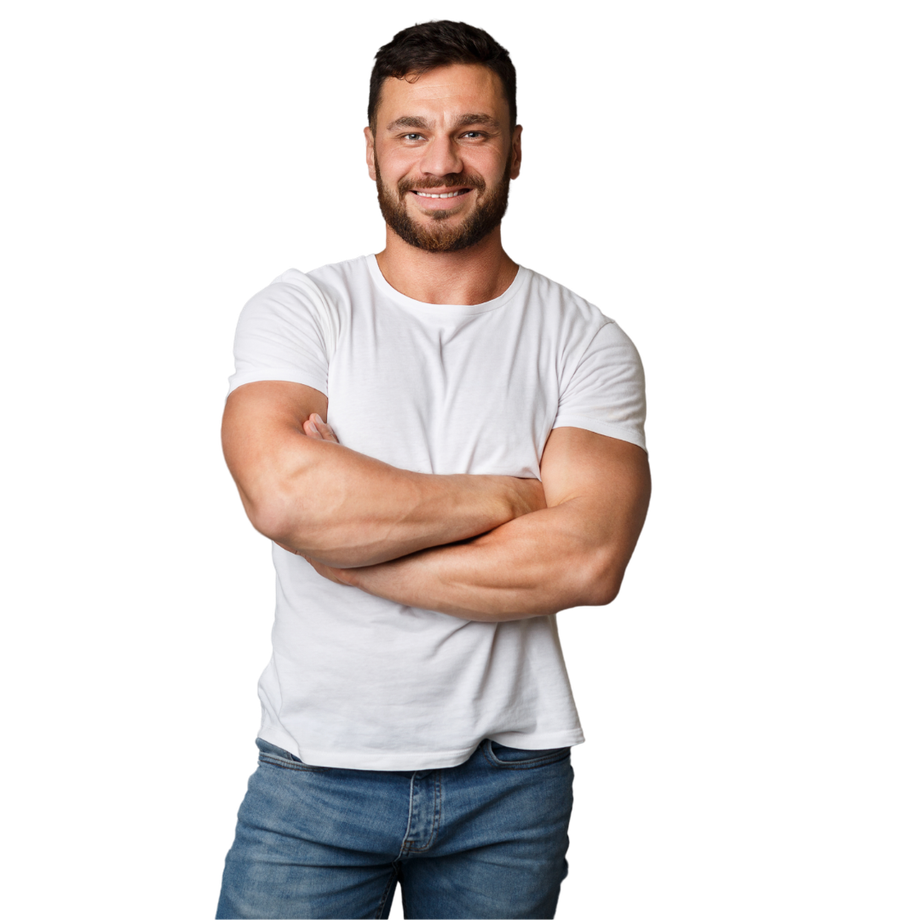 Man in blue overalls and cap smiles, tipping his cap, wearing work gloves.