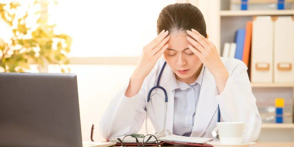 Stressed Doctor at Office – Anchorage, AK – Counseling Solutions of Alaksa LLC