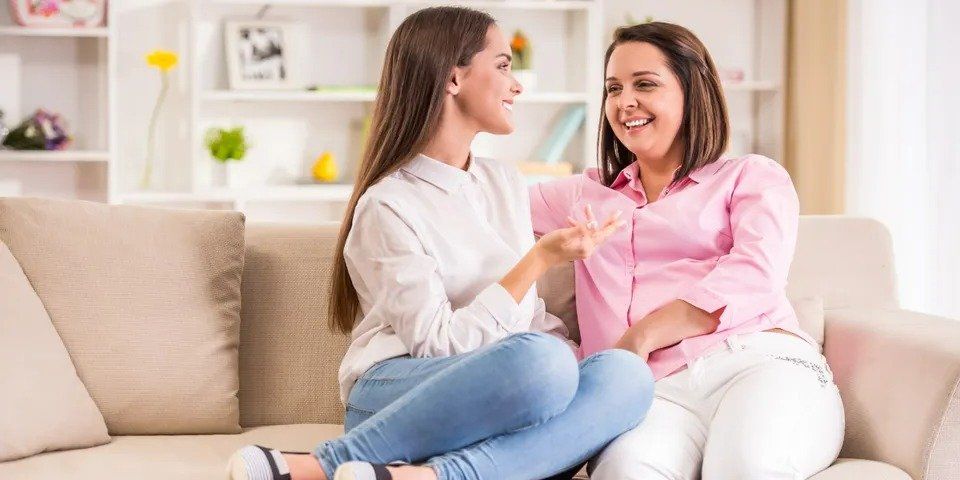 Women on Sofa Talking – Anchorage, AK – Counseling Solutions of Alaksa LLC