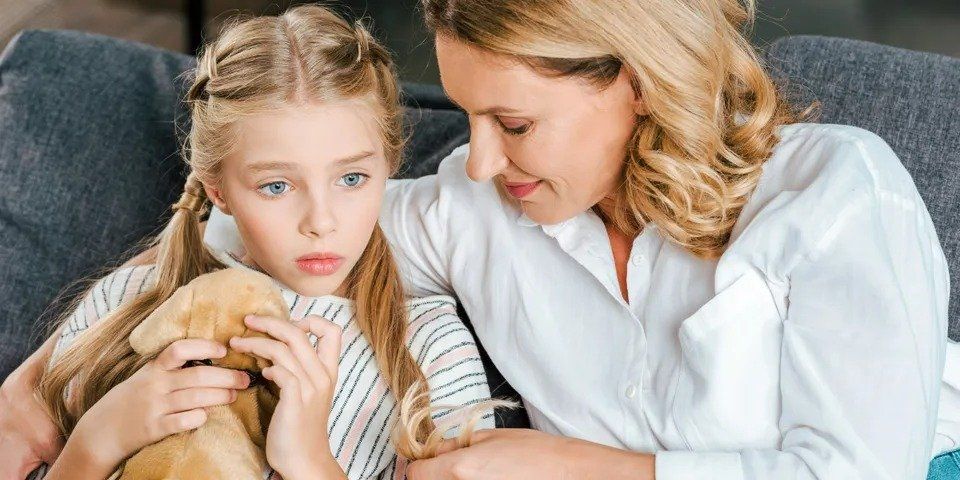 Woman Comforting Young Girl – Anchorage, AK – Counseling Solutions of Alaksa LLC