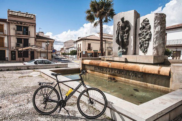 A bicycle next to the fountain in Fuente Vaqueros dedicated to F. Garcia Lorca