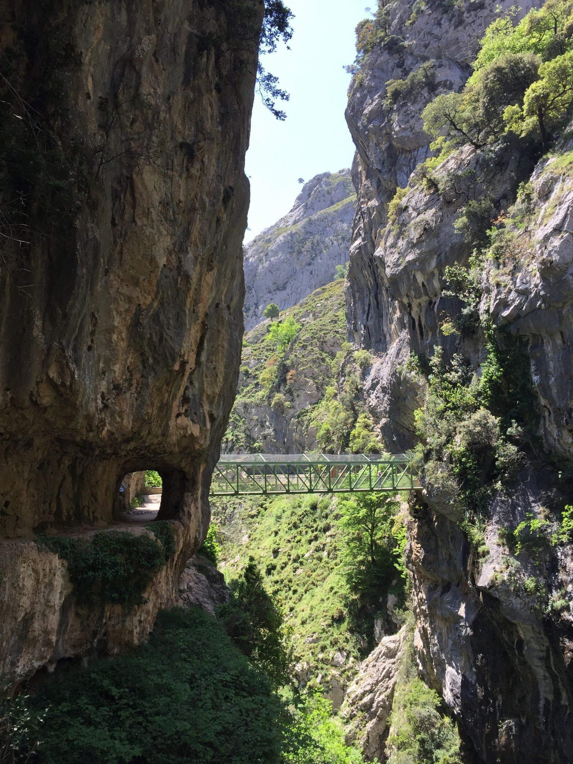 A steel pedestrain walkway constructed between the walls of the Cares Gorge in Asturias in Spain