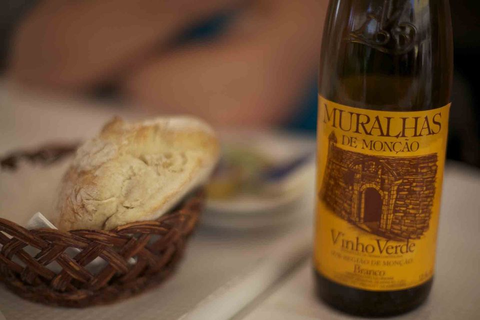Portuguese bread with a bottle of Muralhas de Monção vinho verde wine