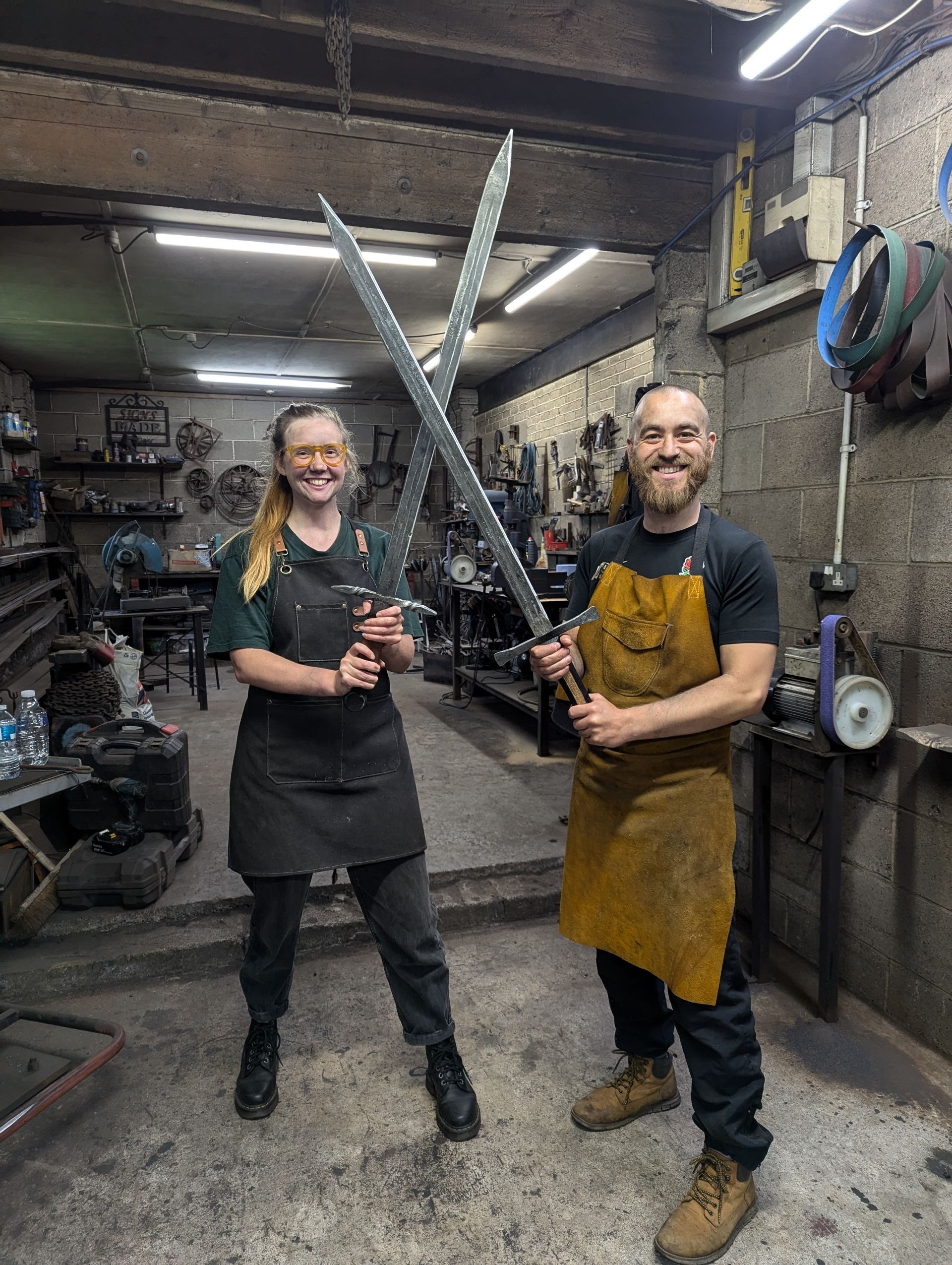 blacksmith students with swords