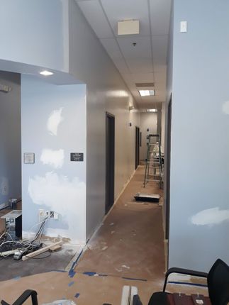 this is a chiropractor office remodel in South Charlotte area (painting, flooring, cabinets)