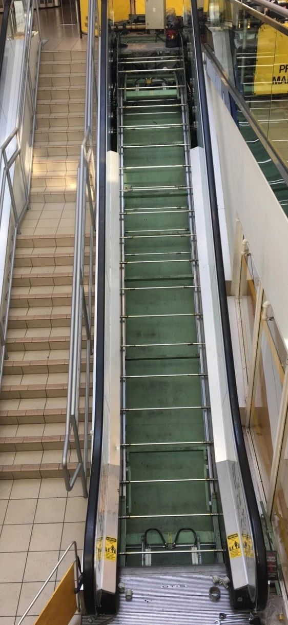 Escalator being repaired