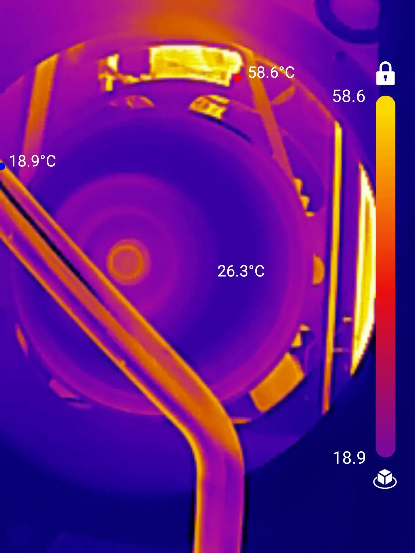 Thermal image of a circular mechanism with temperature readings; orange/yellow highest at 58.6°C, blue lowest at 18.9°C.