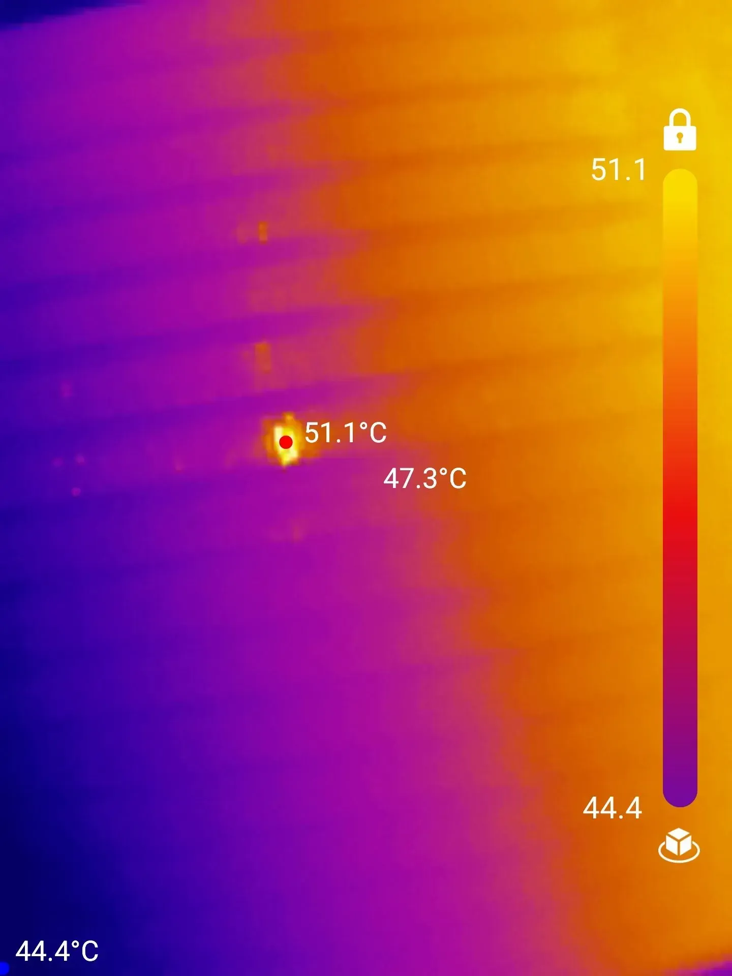 Thermal image showing a hot spot at 51.1°C against a cooler surface, gradient from purple (44.4°C) to yellow (51.1°C).