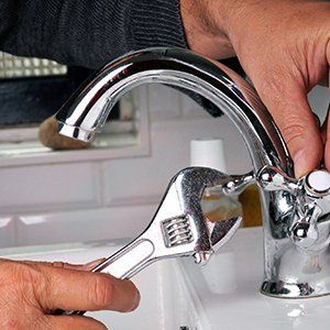Plumbing Repair — Fixing Faucet in Indianapolis, IN