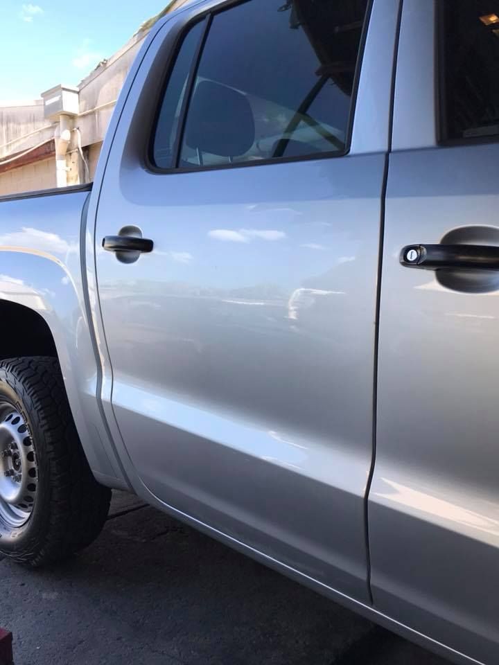 A Silver Truck is Parked in Front of a Building — Dek-A-Dent Townsville In Wulguru, QLD