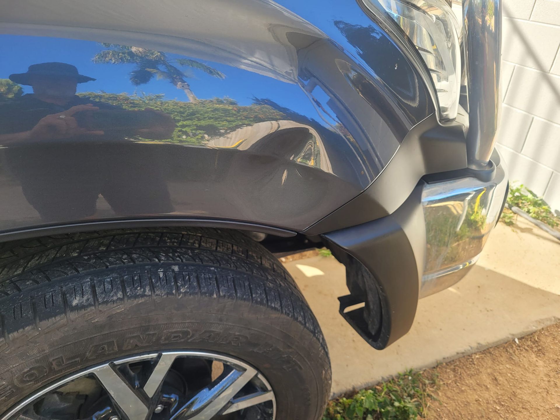 A Black Truck is Parked on the Side of the Road — Dek-A-Dent Townsville In Wulguru, QLD