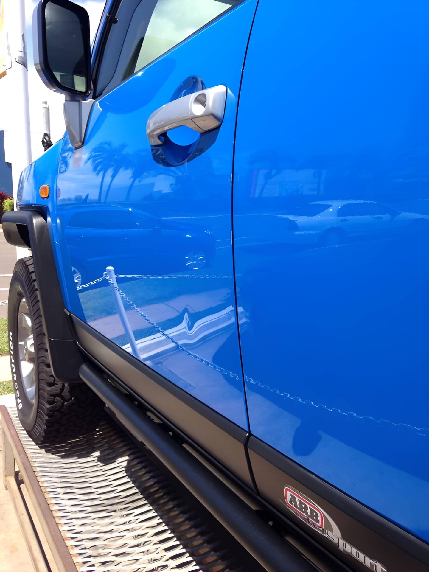 A Blue Car With the Word Toyota on the Side — Dek-A-Dent Townsville In Wulguru, QLD