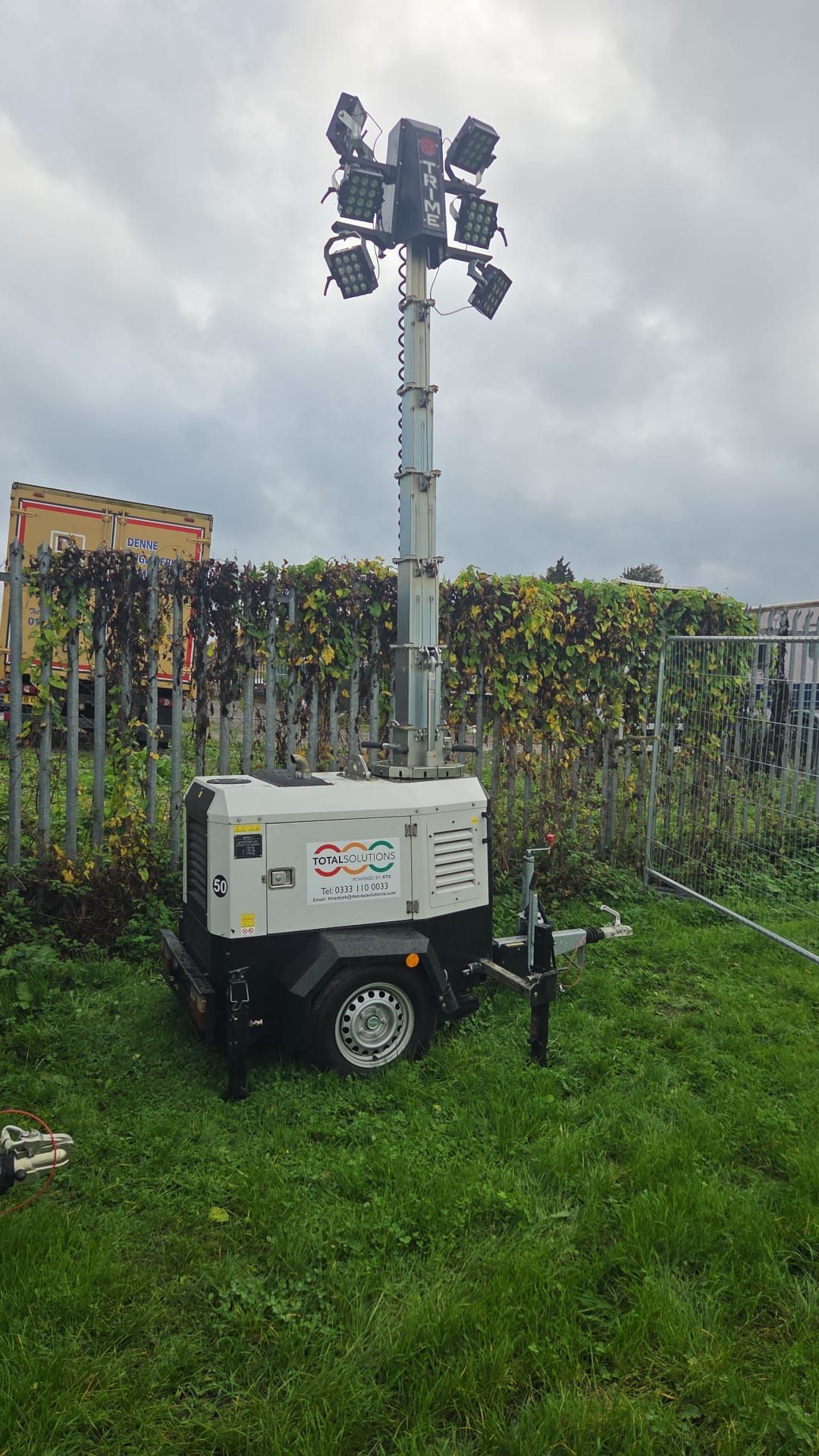 Monochrome close-up of a computer motherboard, showing the CPU socket, and other components.