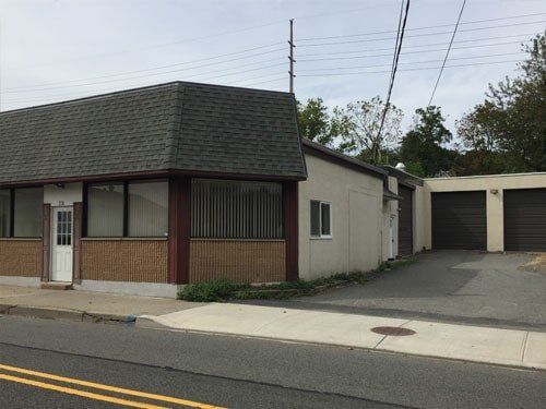 Freestanding Warehouse  With Glass Windows — Clifton, NJ — Evergreen Commercial Real Estate Brokers Inc