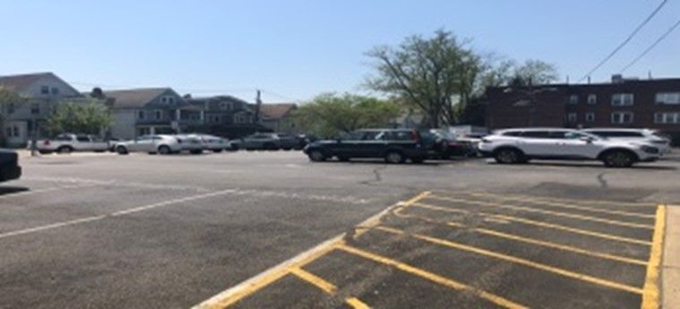 A Parking Lot with A Lot of Cars Parked — Clifton, NJ — Evergreen Commercial Real Estate Brokers Inc