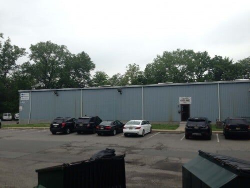 Cars Parked On Fully Leased Warehouse — Clifton, NJ — Evergreen Commercial Real Estate Brokers Inc
