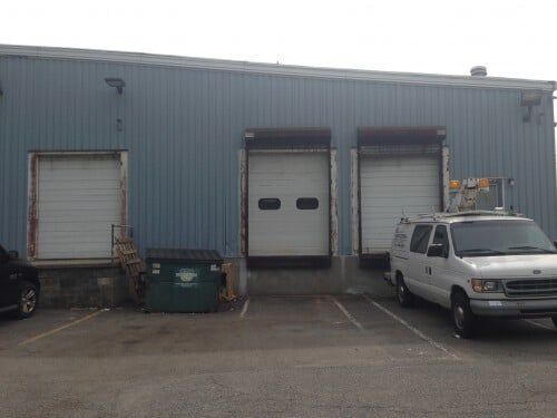 Fully Leased Warehouse Doors — Clifton, NJ — Evergreen Commercial Real Estate Brokers Inc