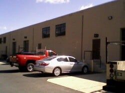 Red & White Car On Parking Lot — Clifton, NJ — Evergreen Commercial Real Estate Brokers Inc