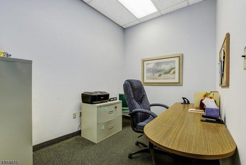 Office Condo Desk — Clifton, NJ — Evergreen Commercial Real Estate Brokers Inc