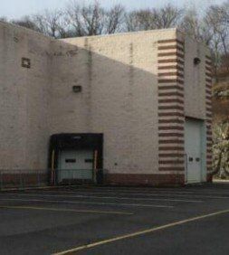 Warehouse With Fence — Clifton, NJ — Evergreen Commercial Real Estate Brokers Inc