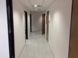 Office Doors In Hallway — Clifton, NJ — Evergreen Commercial Real Estate Brokers Inc